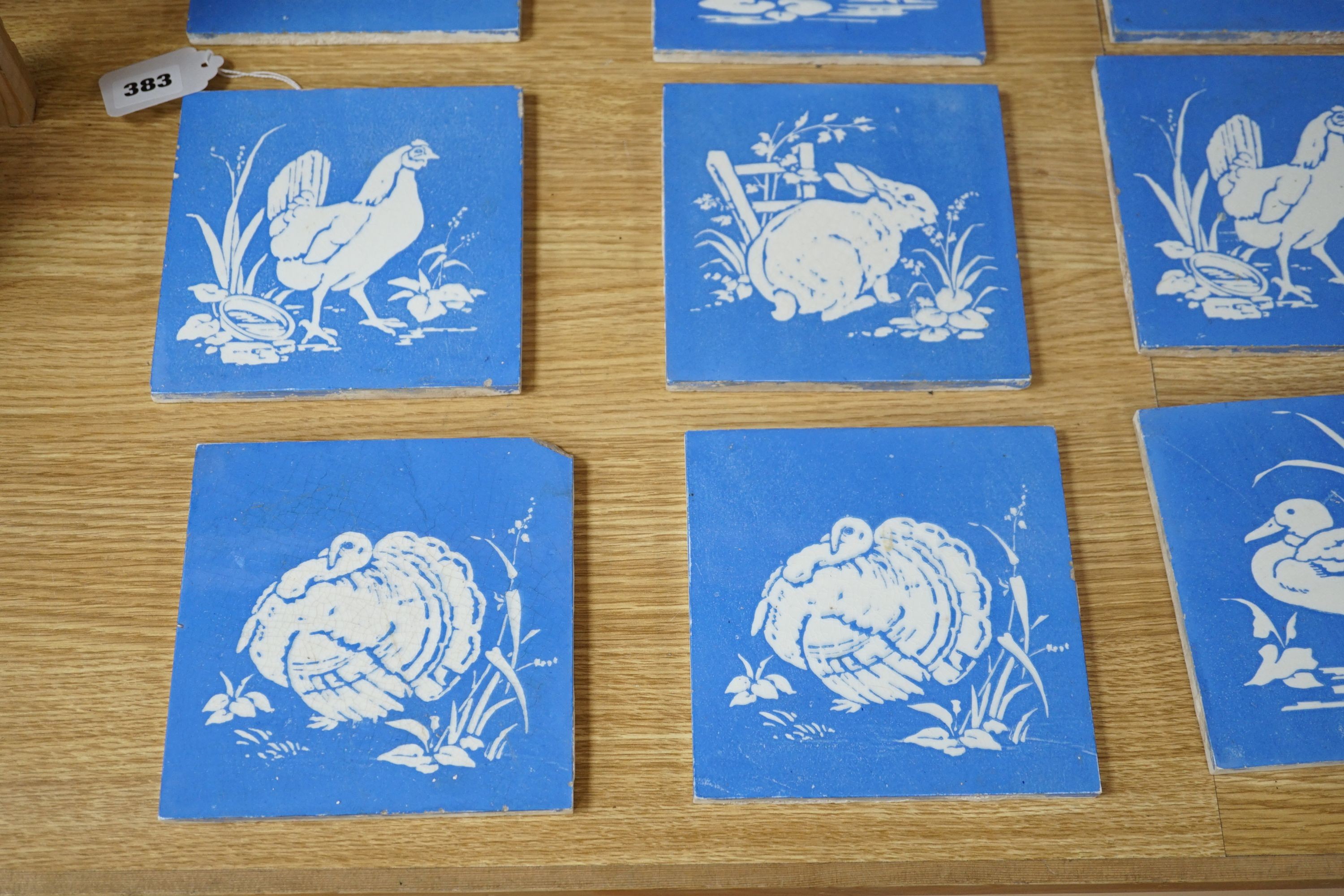 A collection of twelve Mintons China Works blue and white bird tiles, 15cms x 15cms square (each tile).